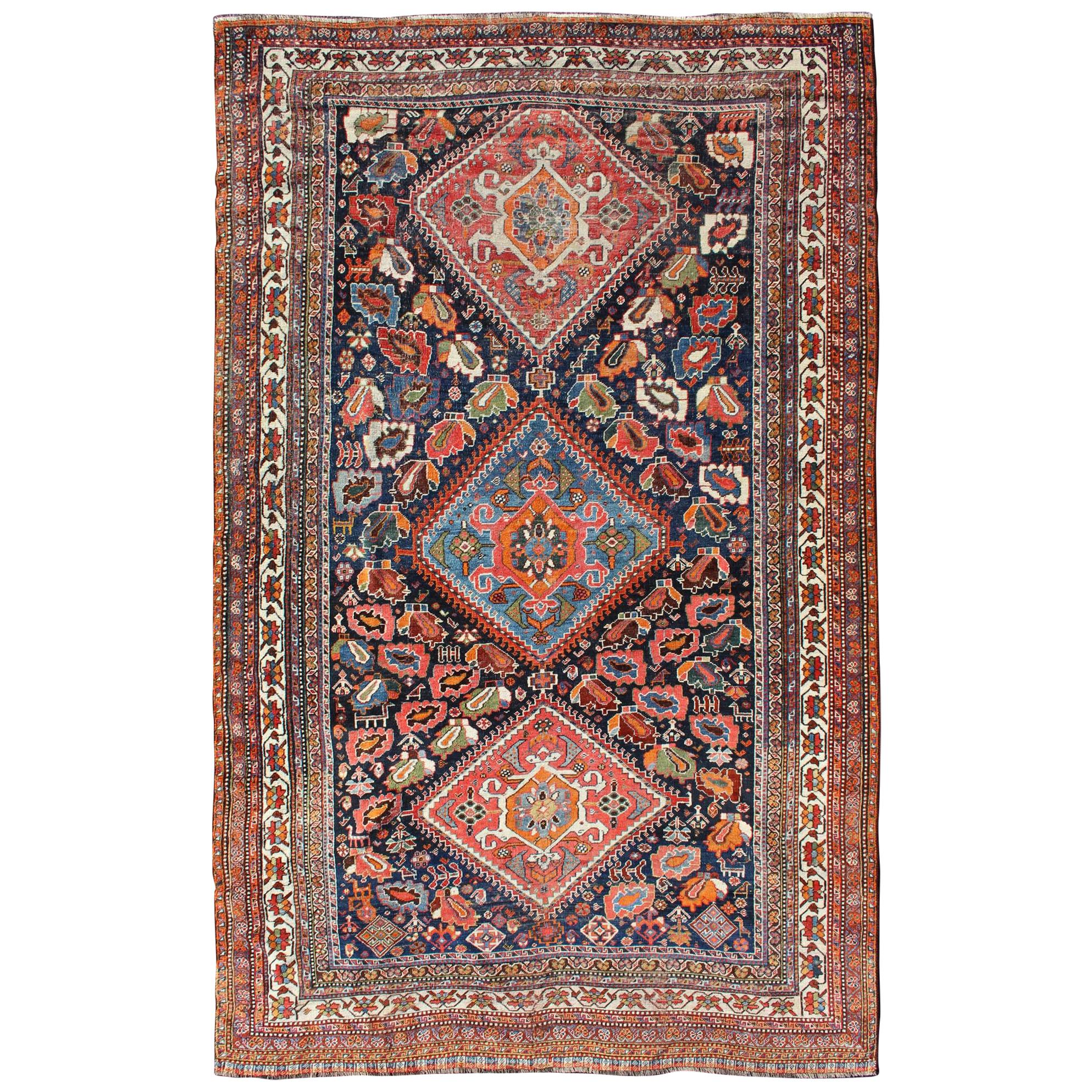 Colorful Tri-Medallion Antique Persian Qashqai Rug with Detailed Tribal Design For Sale