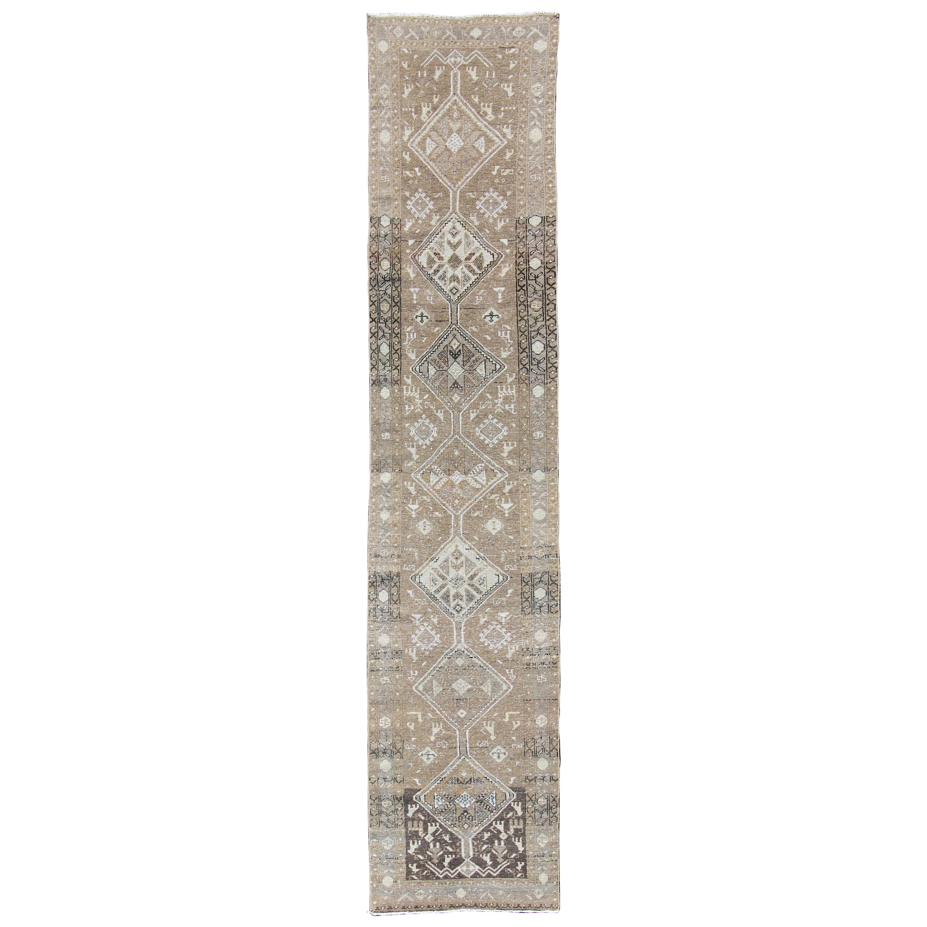 Earth Tone Antique Heriz Runner from Persia with Diamond Tribal Medallions For Sale