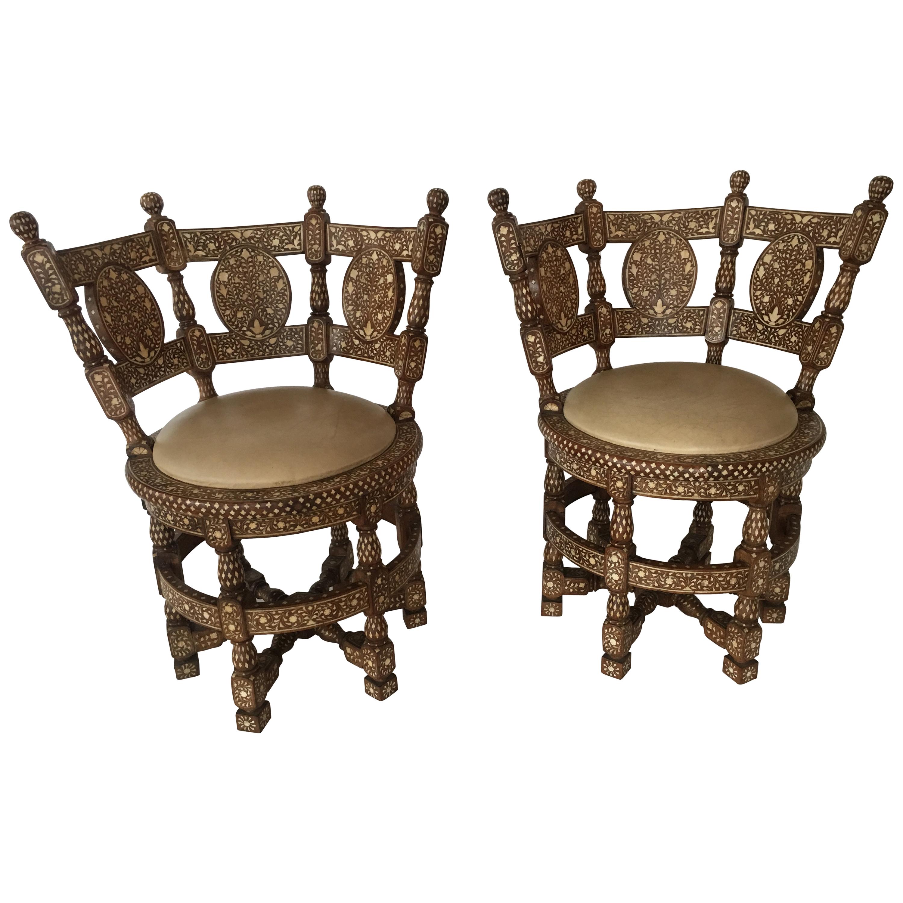 Pair of Colonial lounge chairs. Wood and upholstered Spinneybeck leather, 19th century.