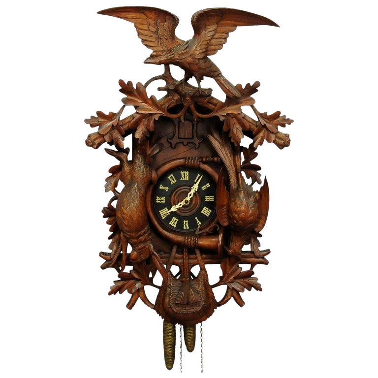 Black Forest Carved Wood Cuckoo Clock with Large Eagle on Top For Sale