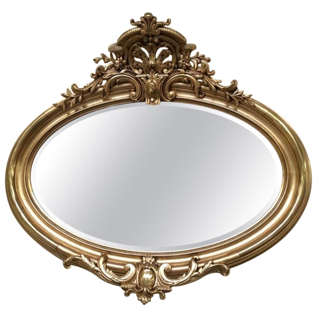 Oval Florentine Antique Mirror with a Gilt Frame For Sale