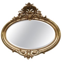 Oval Florentine Antique Mirror with a Gilt Frame