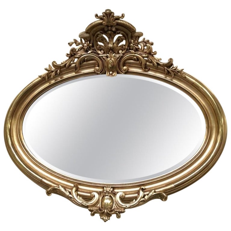 Oval Florentine Antique Mirror with a Gilt Frame For Sale at 1stDibs
