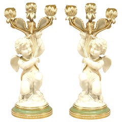 Pair of French Victorian White and Gilt Porcelain Cupid Candelabras
