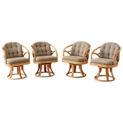 Set of Four McGuire Bamboo Rattan Swivel Armchairs