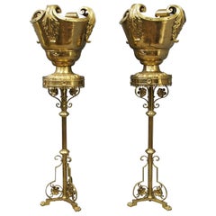 Pair of Gothic Style Cast Brass Stands and Urns