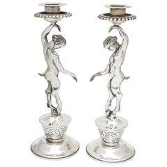 Rare Pair of Midcentury Sterling Silver Mexican Satyr-Form Candlesticks