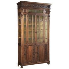 Antique Grand 19th Century Italian Renaissance Hand Carved Walnut Stained Glass Bookcase