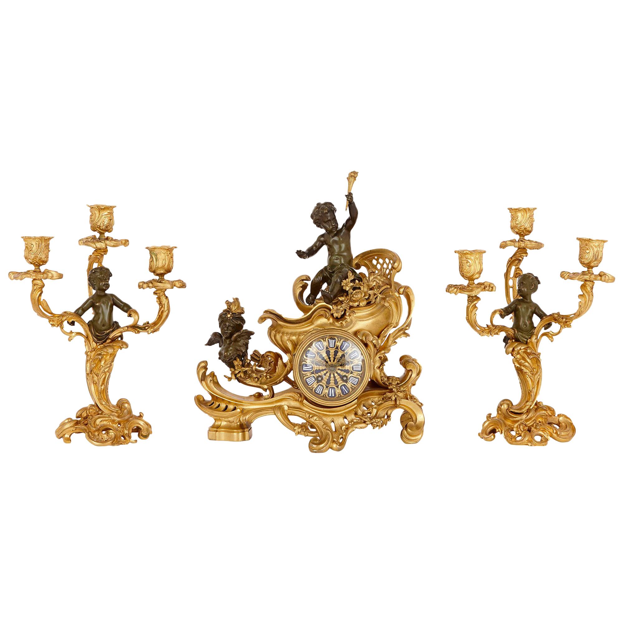 Louis XV Style Gilt and Patinated Clock Set, Attributed to Linke For Sale