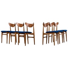 Ensemble de six chaises de salle à manger en chêne, teck et tissu bleu produites au Danemark