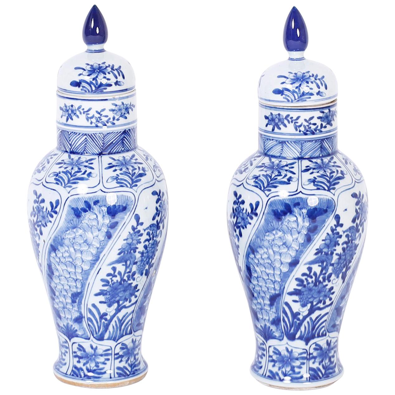 Pair of Blue and White Chinese Porcelain Lidded Urns
