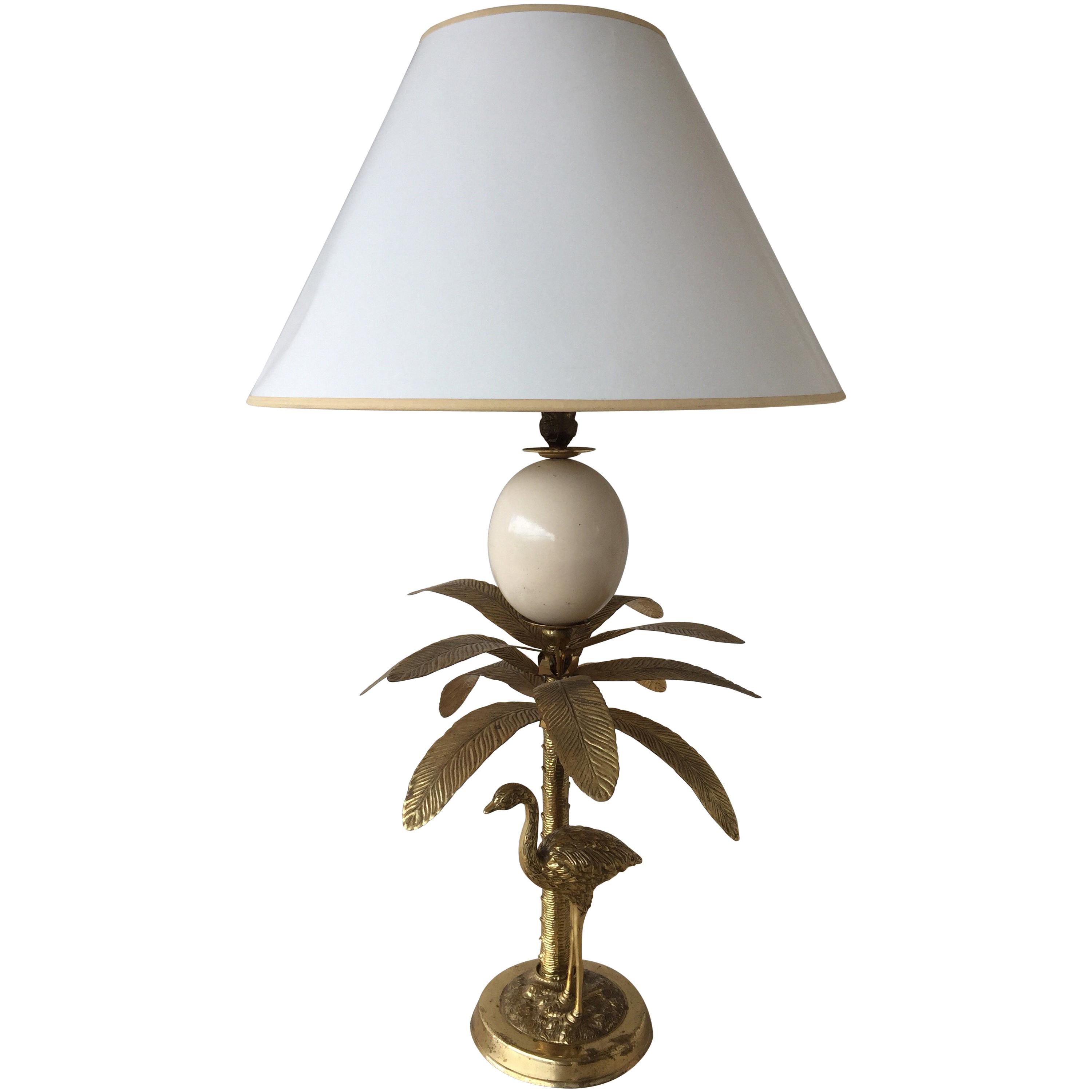 Lámpara de mesa vintage de latón con palmera y huevo de avestruz de imitación