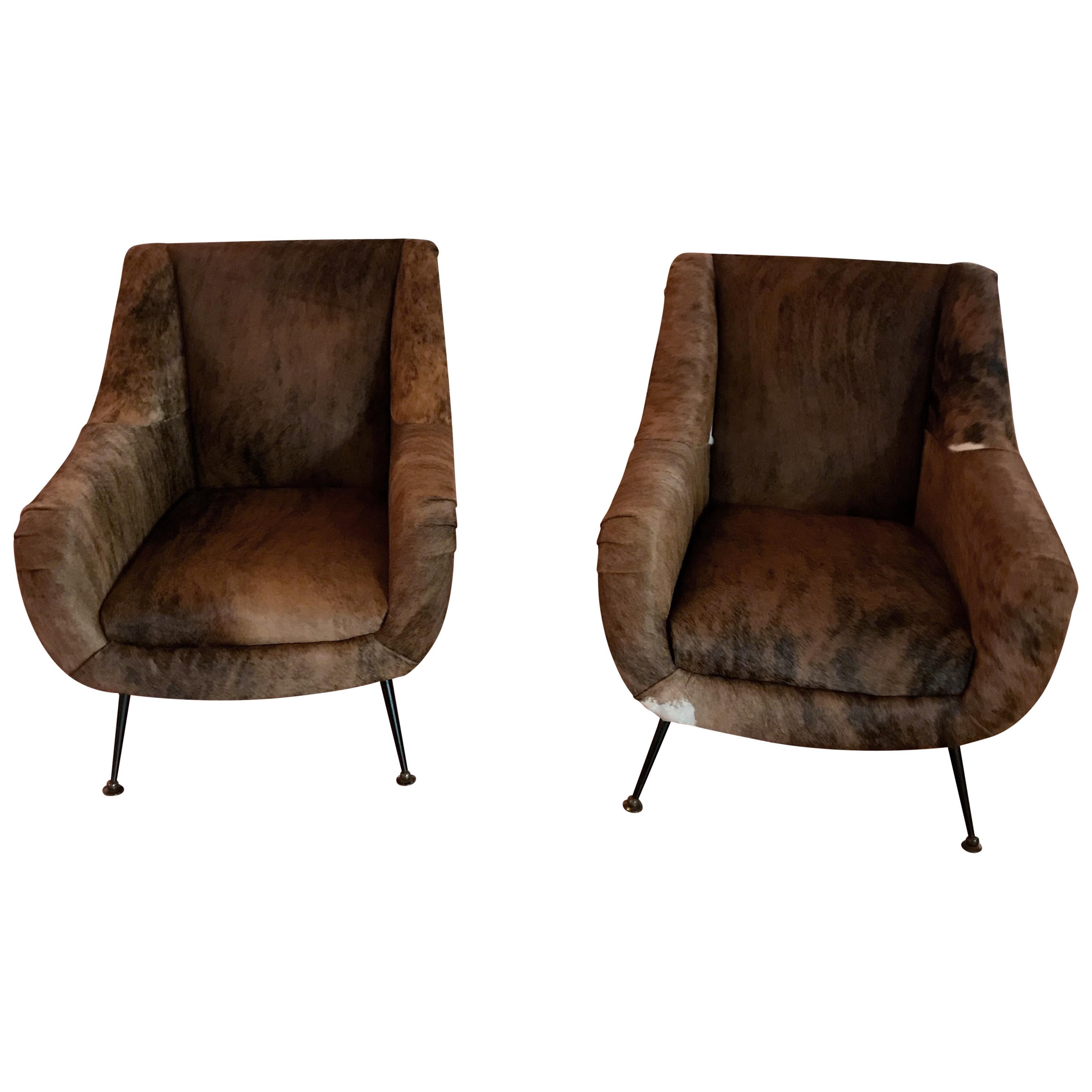 Pair of Italian Mid-Century Modern Club Chairs Covered in Cowhide For Sale
