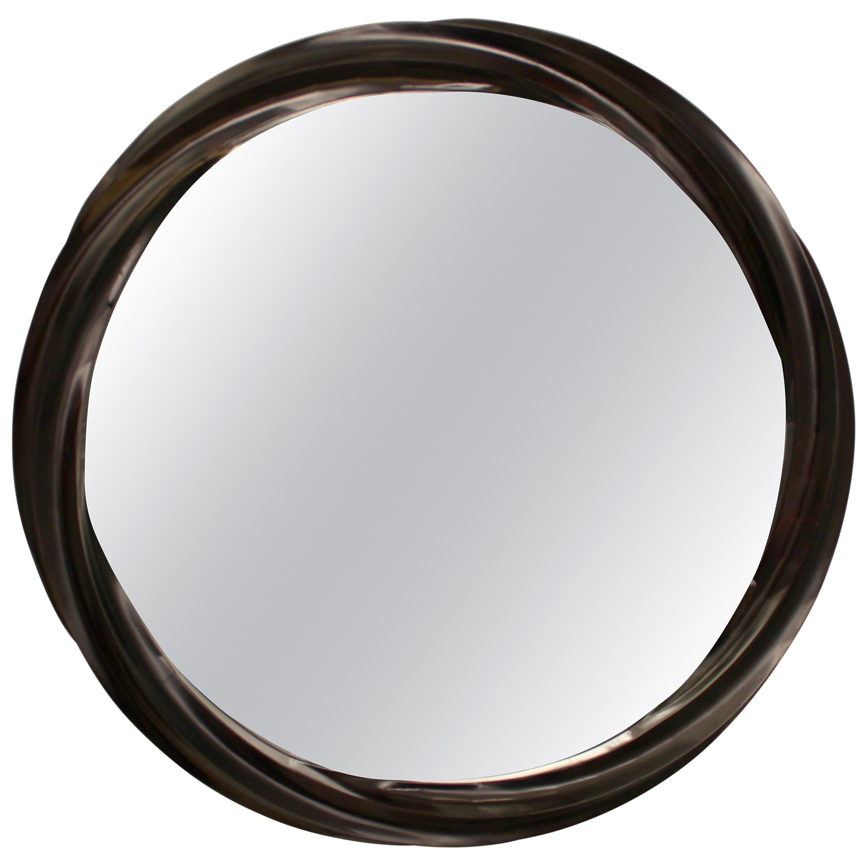 Wave series mirror in hard maple with satin brown varnish