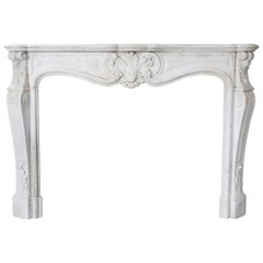Antique Marble Fireplace of Carrara Marble, 19th Century, Louis XV Style