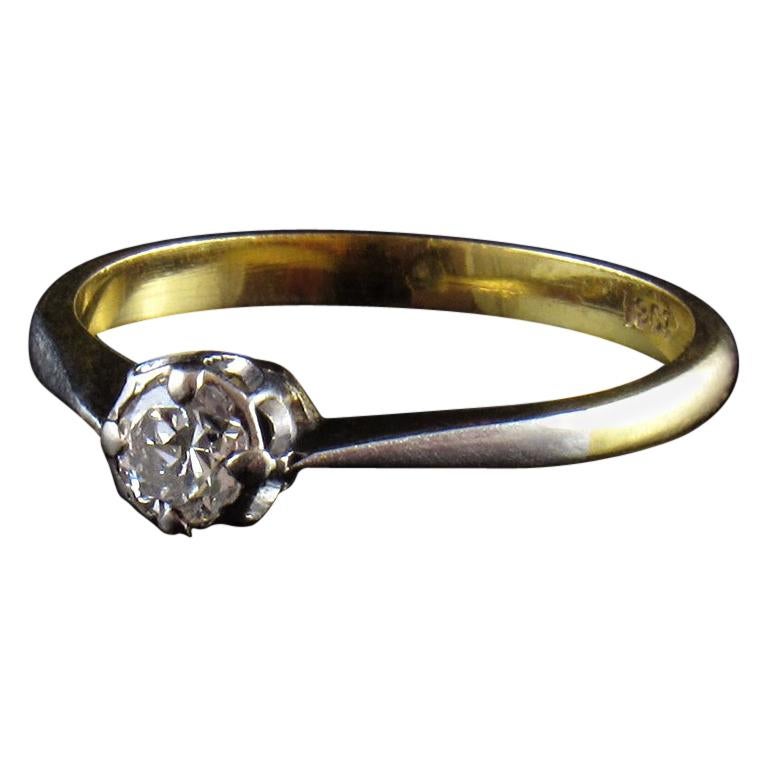 18-Karat Gold Diamond Solitaire Engagement Ring in Classic Four Prong Setting