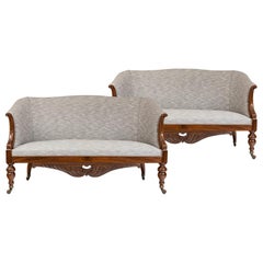 Pair of Charles X Sofas with Carved Mahogany Showwood Frames