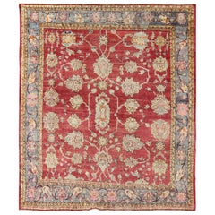 Tapis turc ancien d'Oushak à bordure rouge, bleu/gris, L. vert, jaune et rose