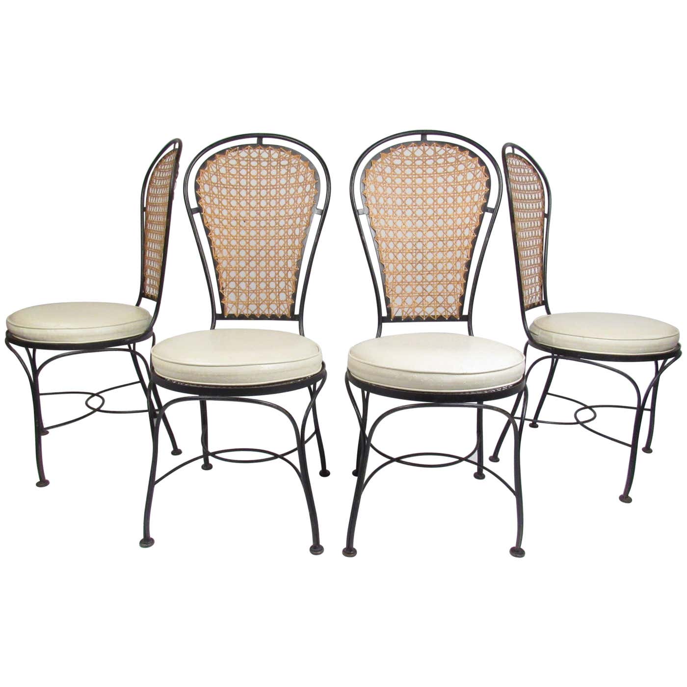 Set of Four Midcentury Wrought Iron Dining Chairs with a Cane Backrest ...