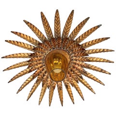 Midcentury Unusual Sunburst Ceiling Metal Fixture with Glass Tulip