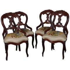 Antique Four Victorian Carved Walnut and Crewel Embroidery Balloon Back Chairs