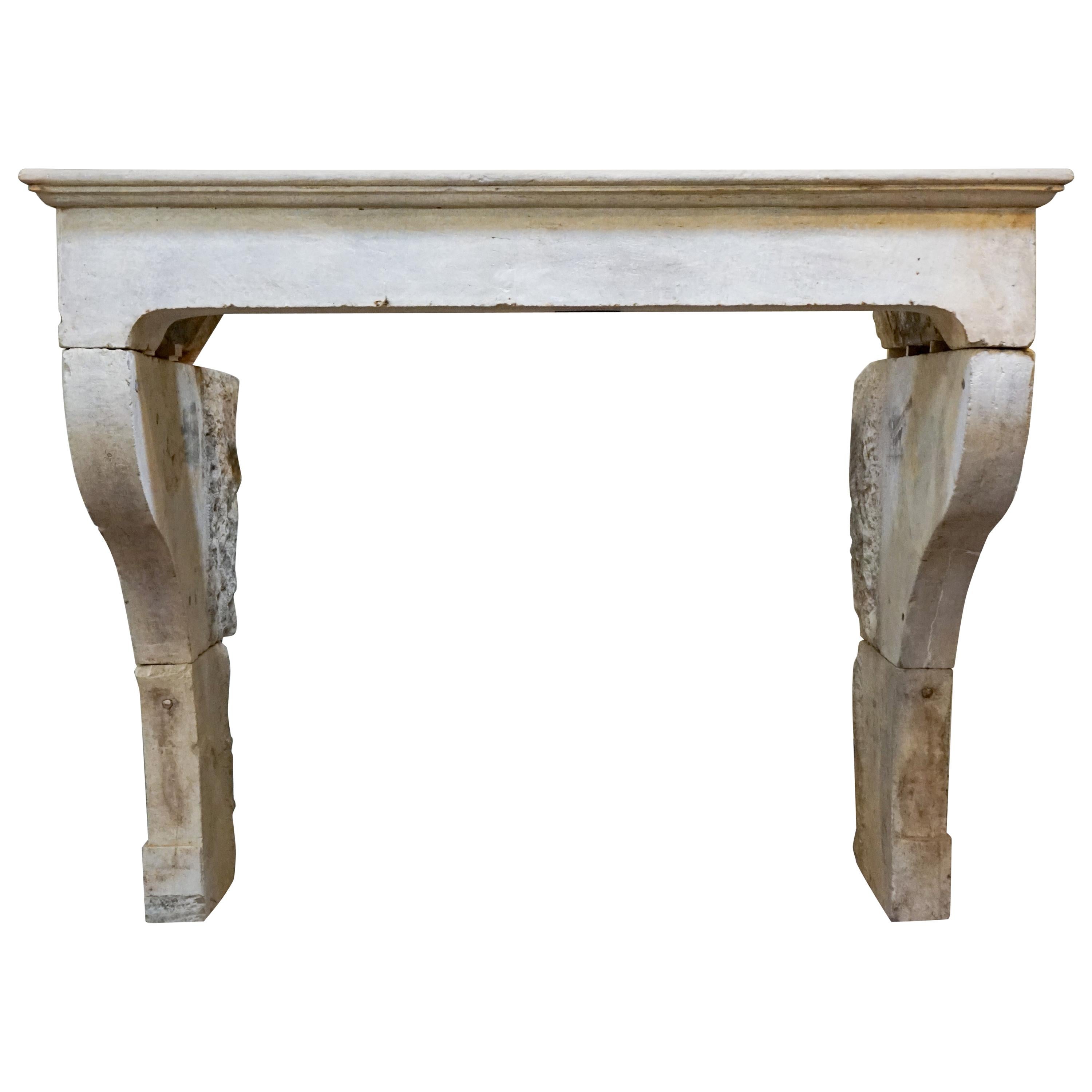 This French Limestone Mantel from the 1680s has been expertly reclaimed from France and features an antique Louis XIII style. Made of genuine limestone, it adds a touch of historic elegance and sophistication to any room.
