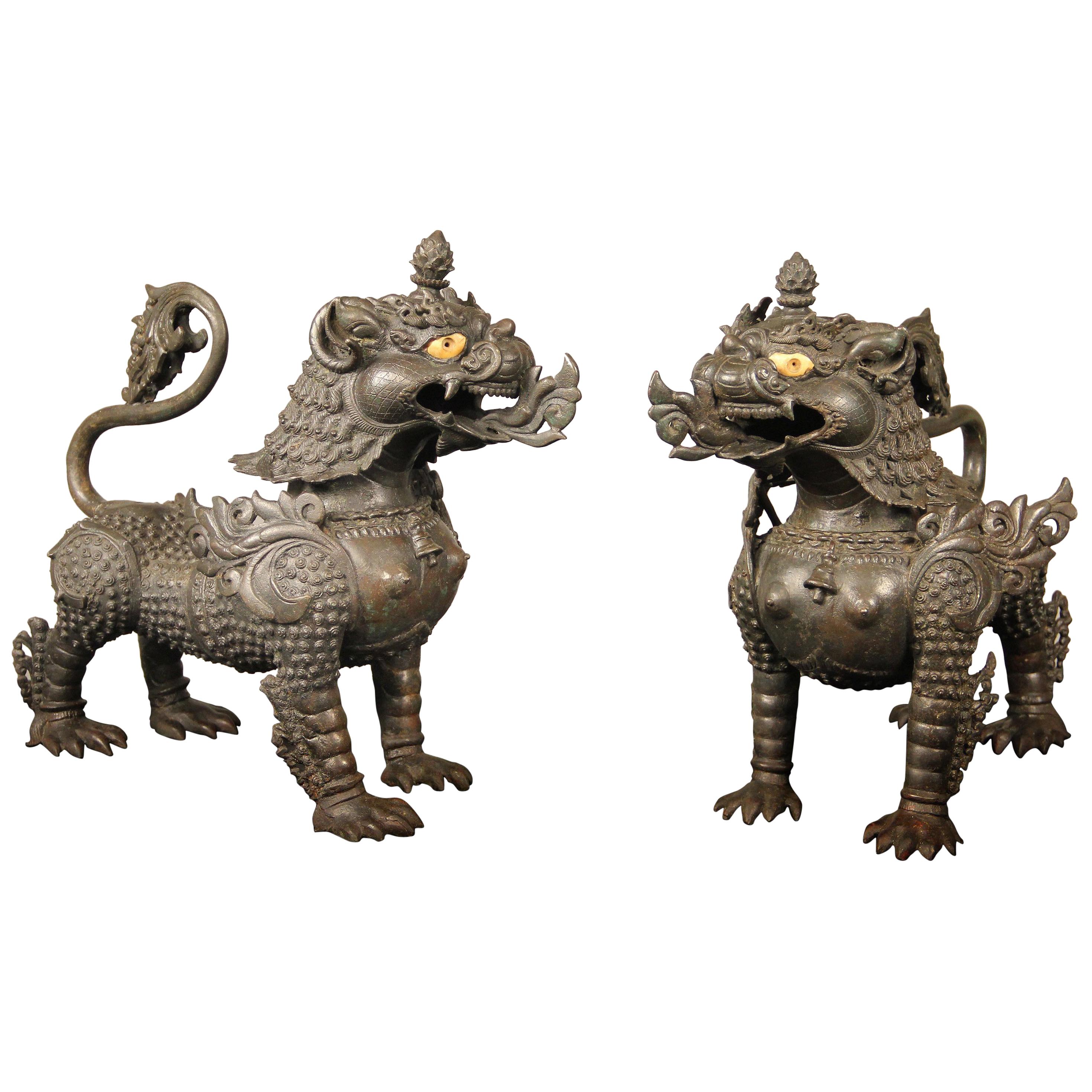 Fine Pair of Late 19th-Early 20th Century Chinese Iron Foo Dog Dragons