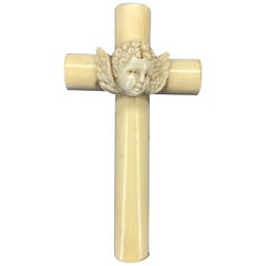 Small Faux Ivory Celluloid Crucifix with Putti with Angel Wings