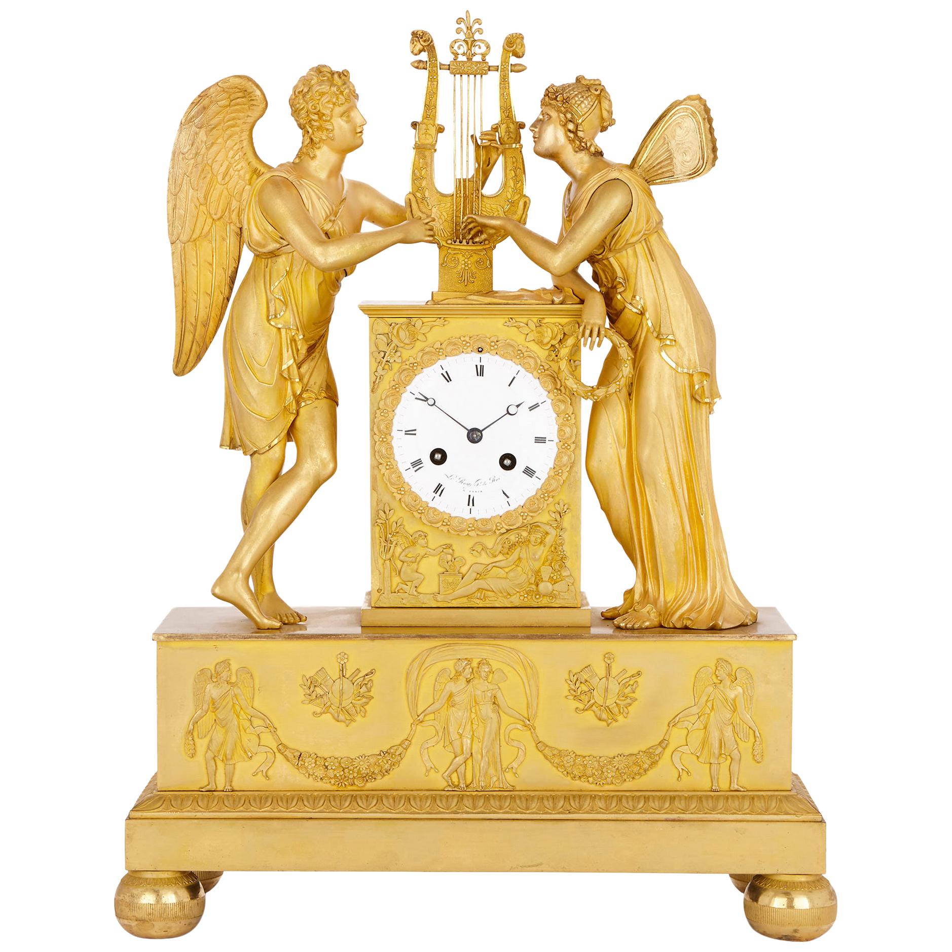 Reloj de bronce dorado de época Imperio con Cupido y Psique de Le Roy et fils