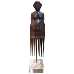 African Makonde Comb from Zimbabwe Bantu Tribe on Acrylic Stand