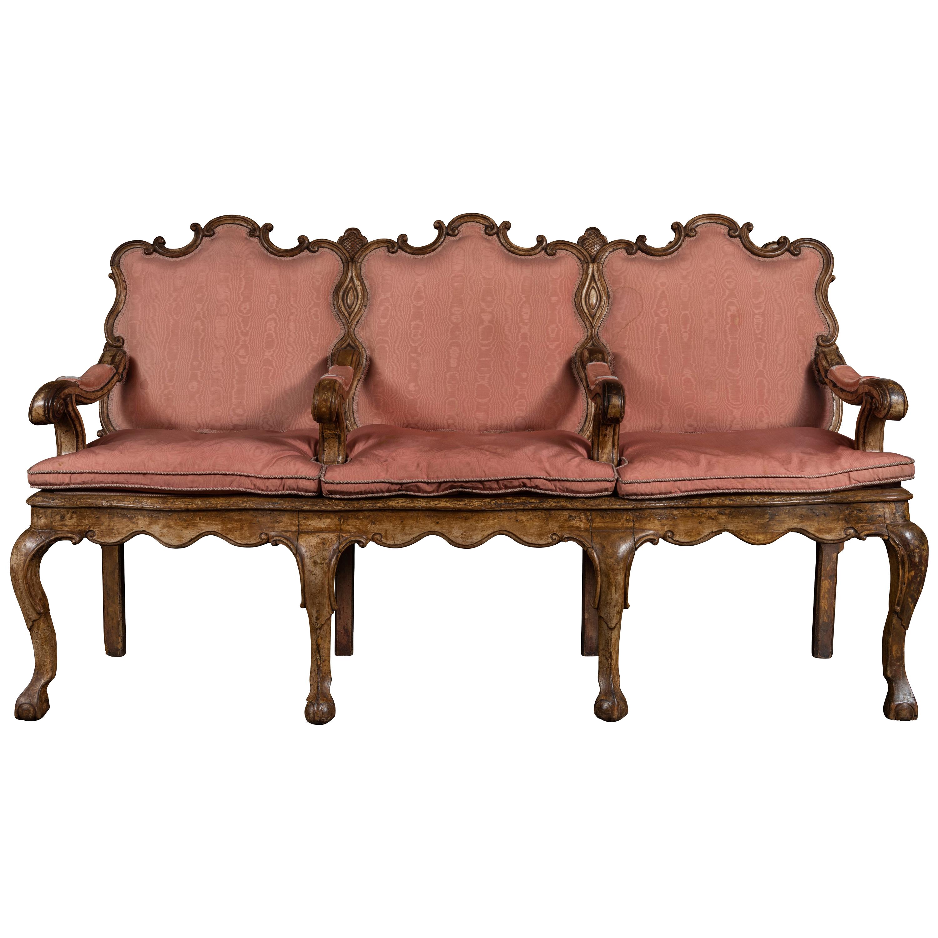 A 17th Century Italian Walnut Three-Seat Divano Upholstered in Pink Silk For Sale