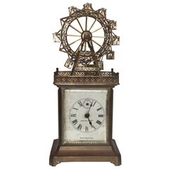 20ème siècle, allemand Grande Roue Novelty Automaton Laiton Carriage Clock