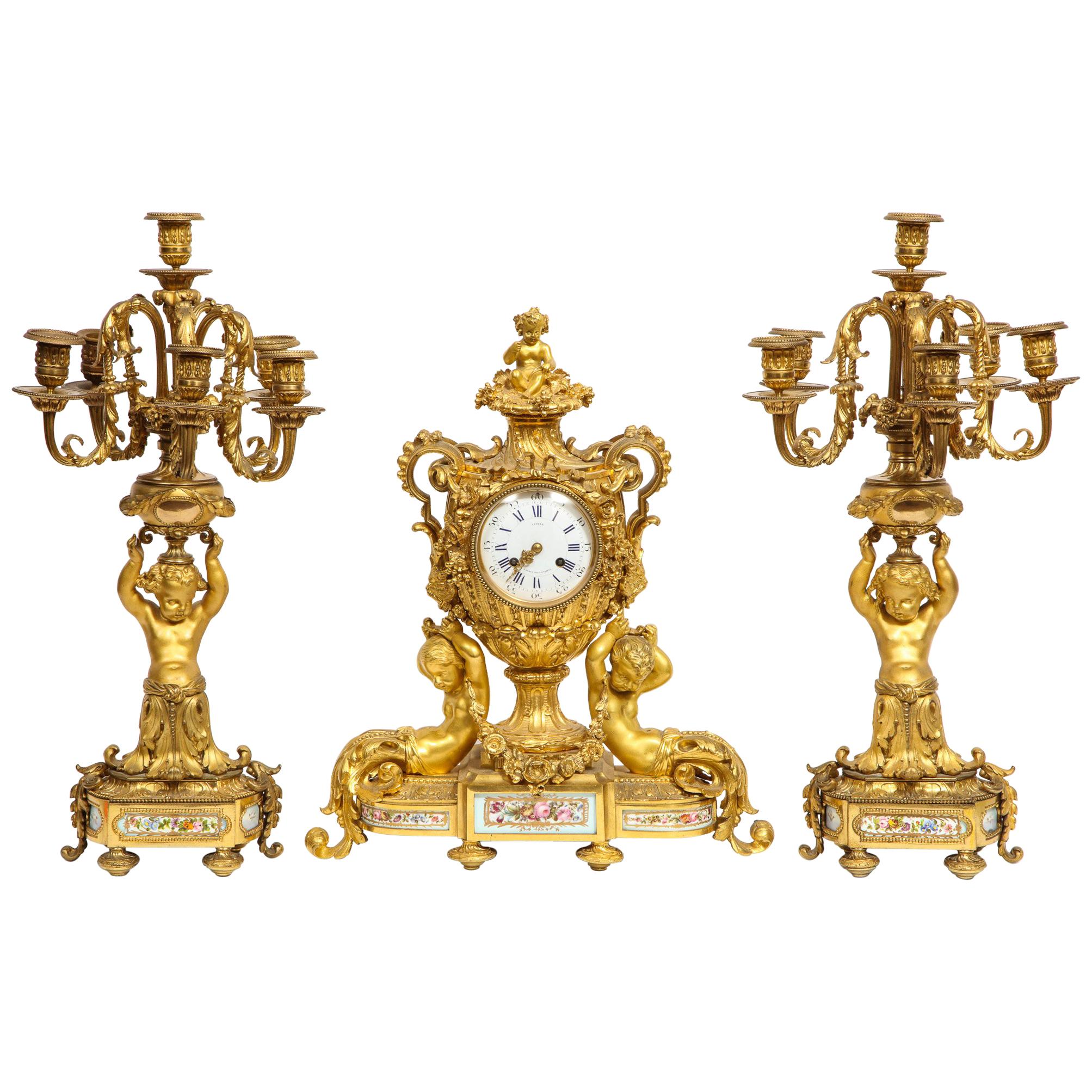 Exceptional French Ormolu-Mounted Porcelain Three-Piece Clock Garniture Set