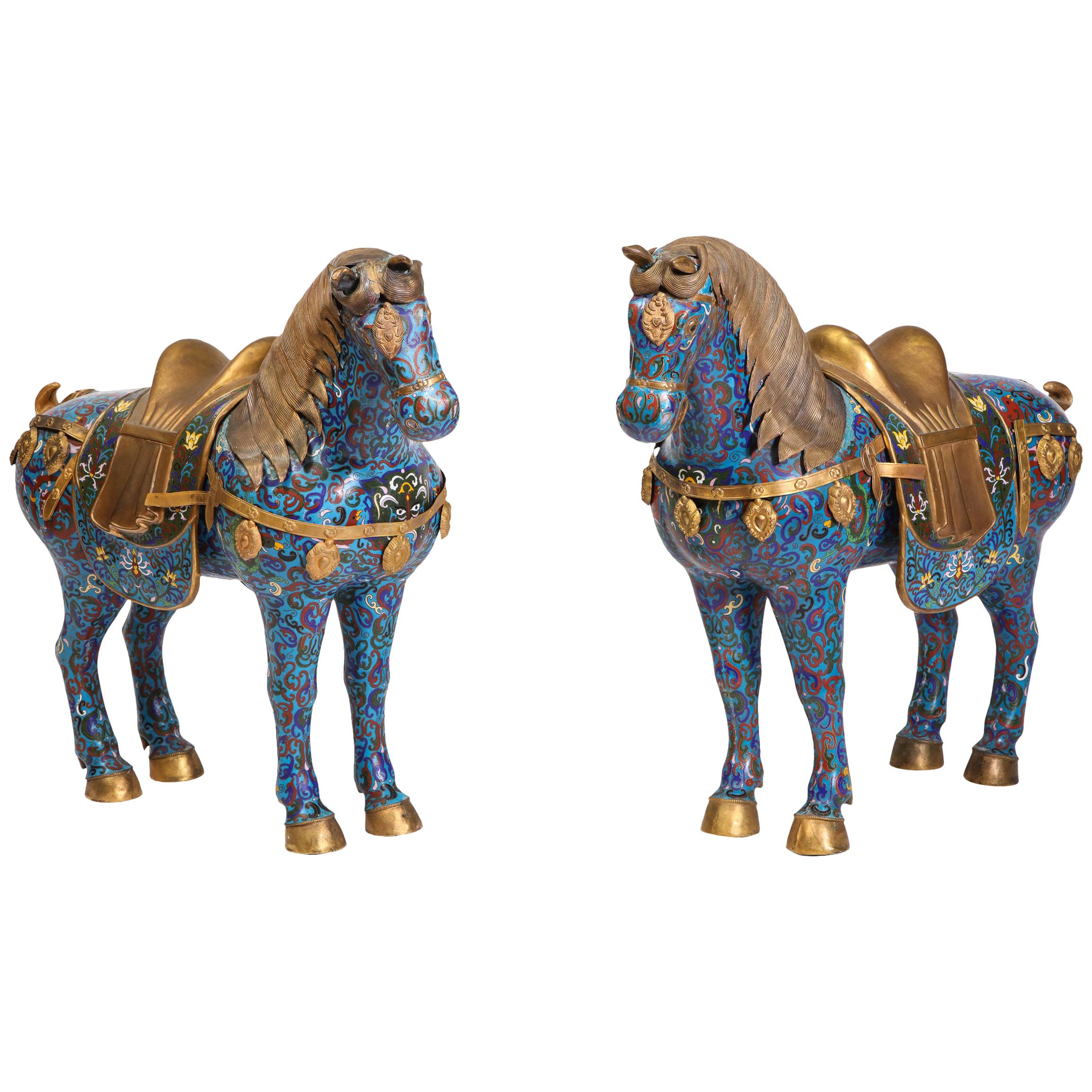 handcrafted in floral patterns over a gilded metal background Pair of Old Chinese Cloisonné Horse Figurines