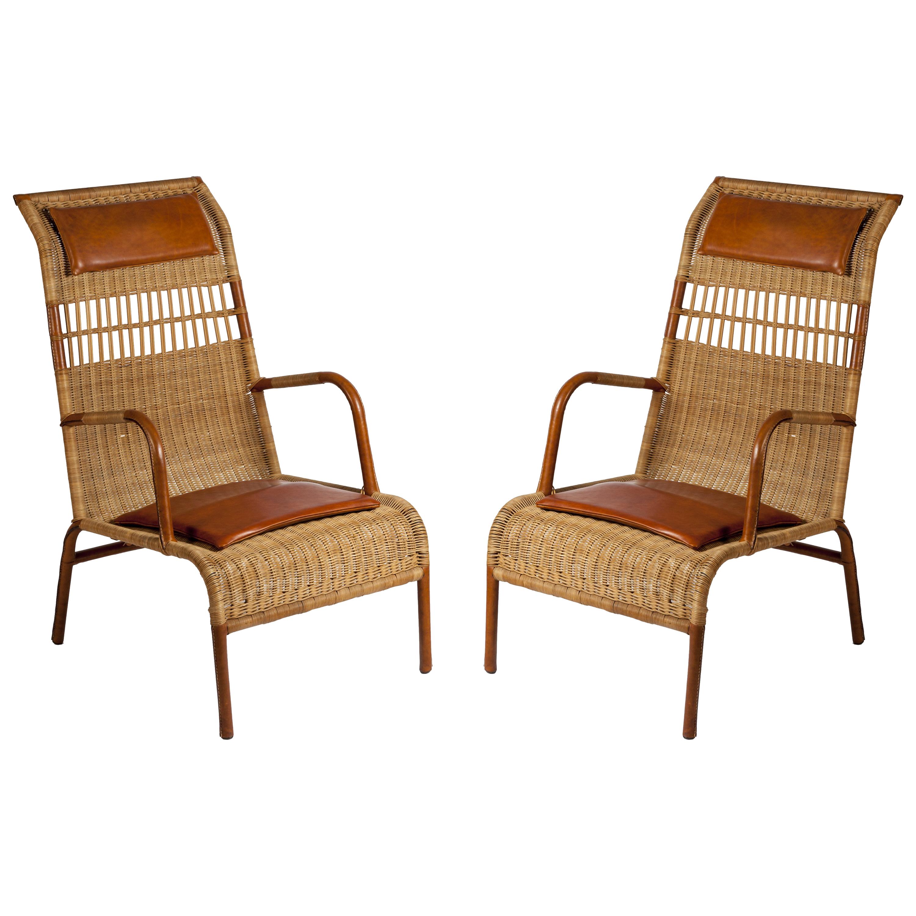 Pair of Stitched Leather and Rattan Armchairs by Jacques Adnet