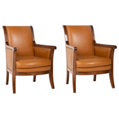 Pair of Louis Philippe Cognac Leather Bergeres