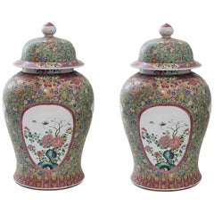 Pair of Famille Rose Porcelain Vases with Covers