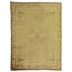 Tapis chinois ancien de couleur pâle