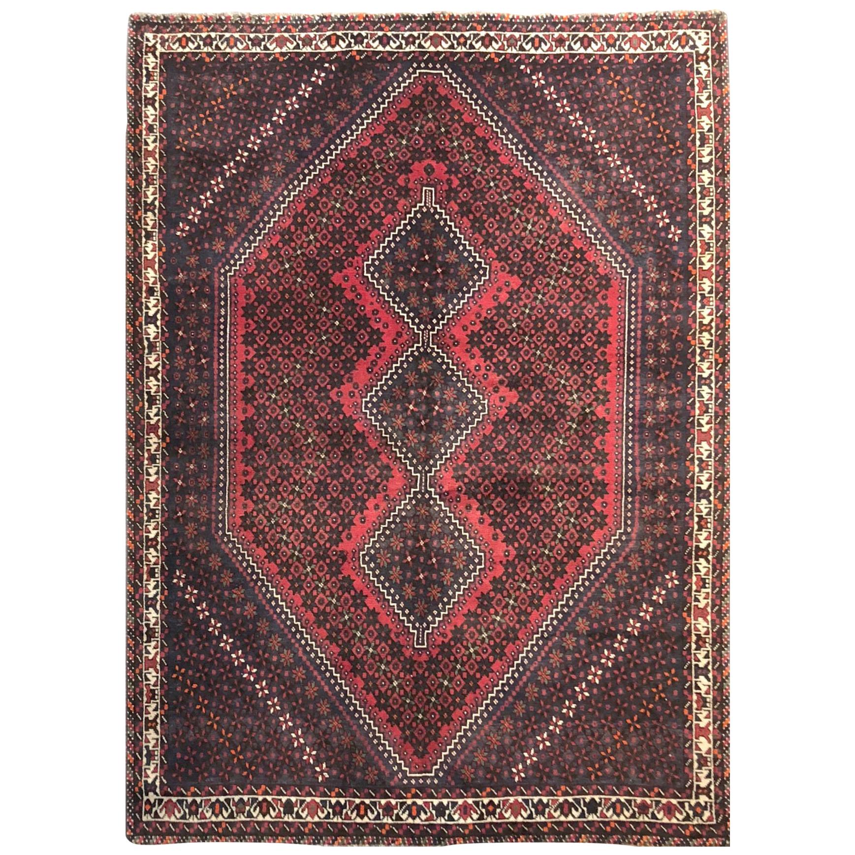 Vieux tapis persan noué à la main, rouge, médaillon répété, Shiraz, vers 1960