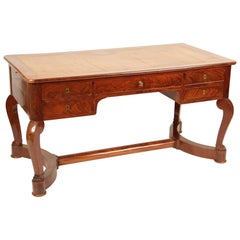 French Restauration Flame Mahogany Desk with a Tooled Leather Top