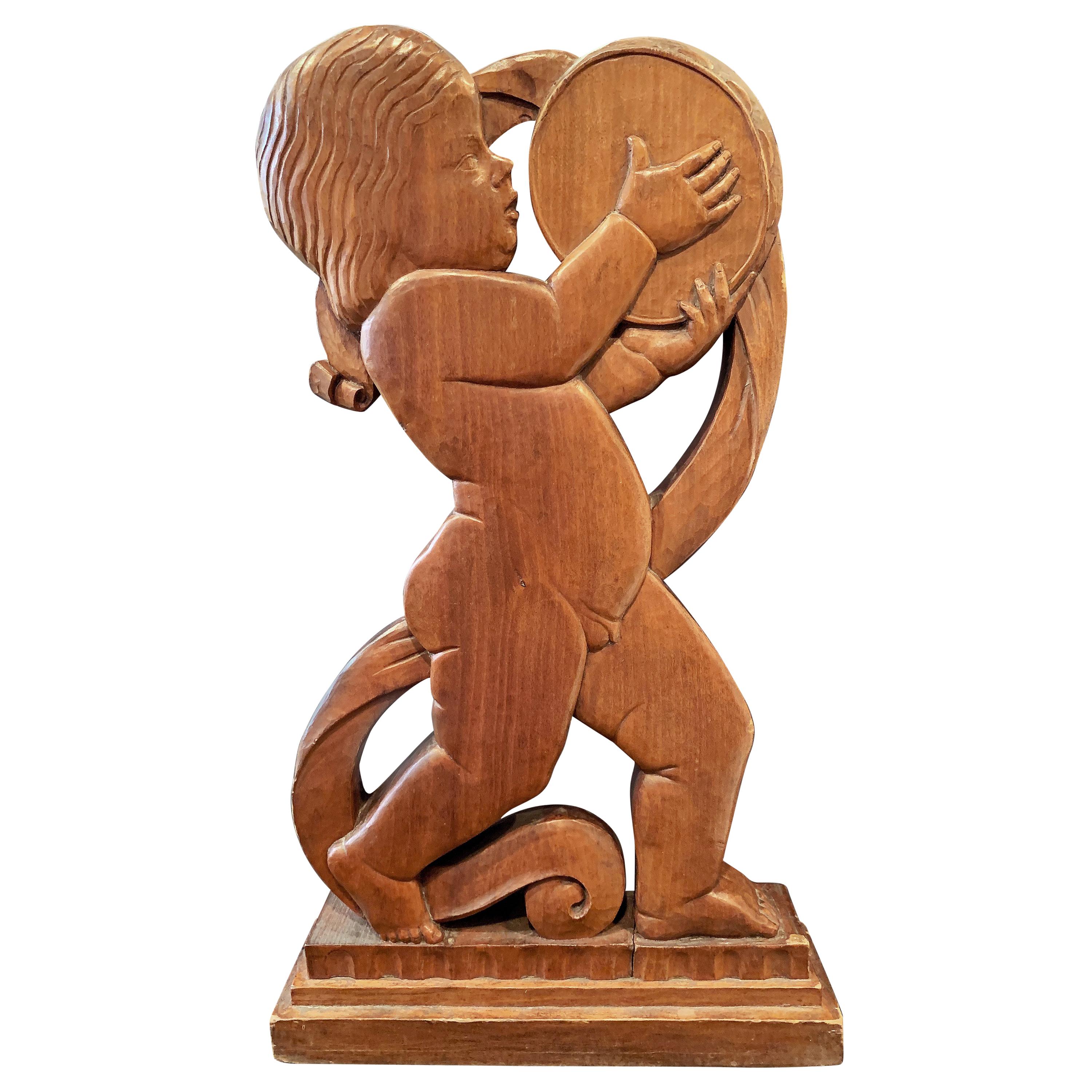 "Baby with Tambourine, " Large, Finely-Carved Art Deco Sculpture in Walnut