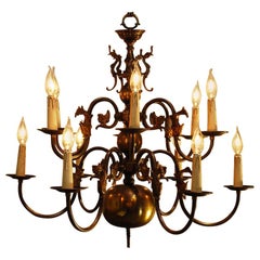 Antique Dutch Brass Two-Tier Twelve-Light Bulbous and Scrolled Chandelier, circa 1910