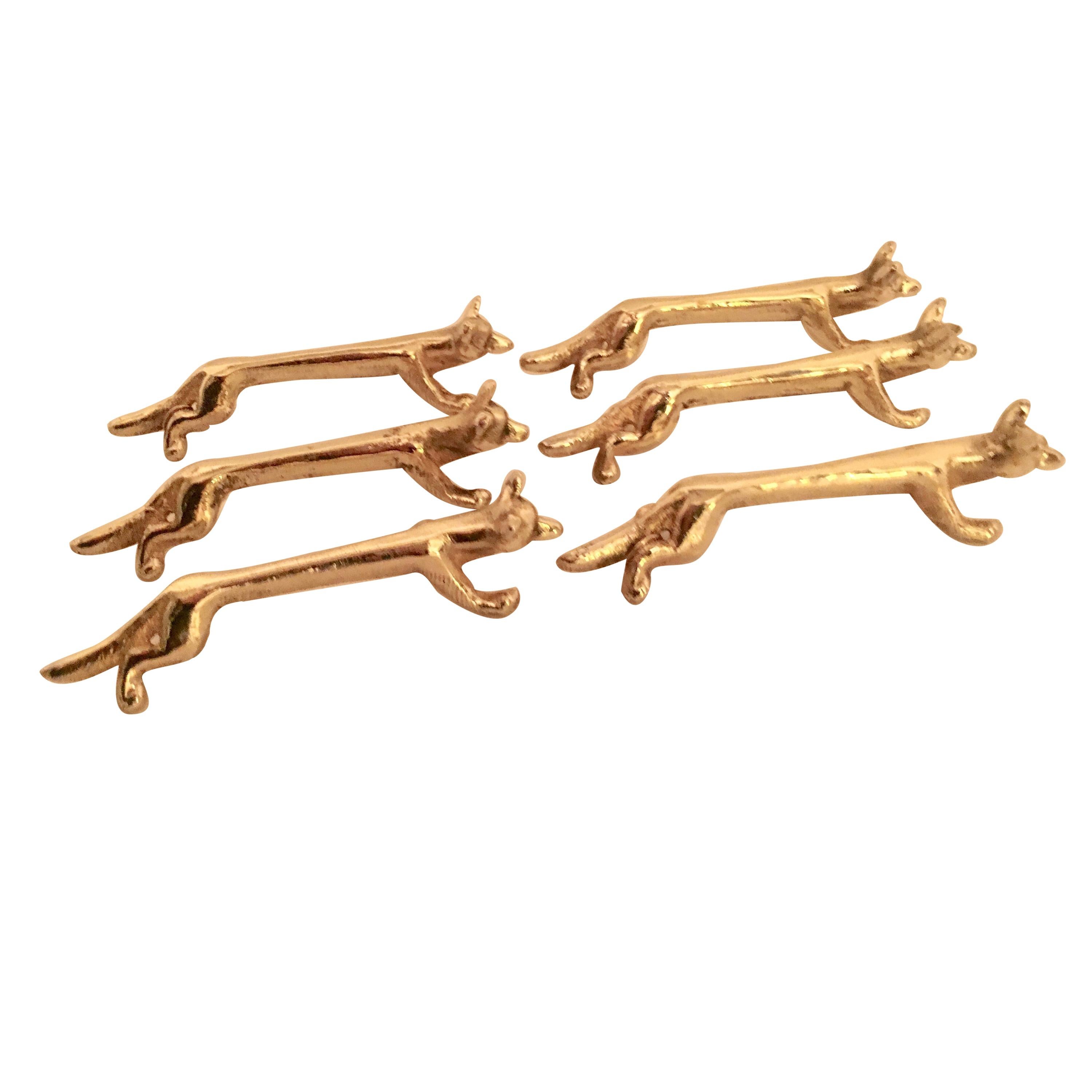 Set of Six Brass Fox Knife Rests