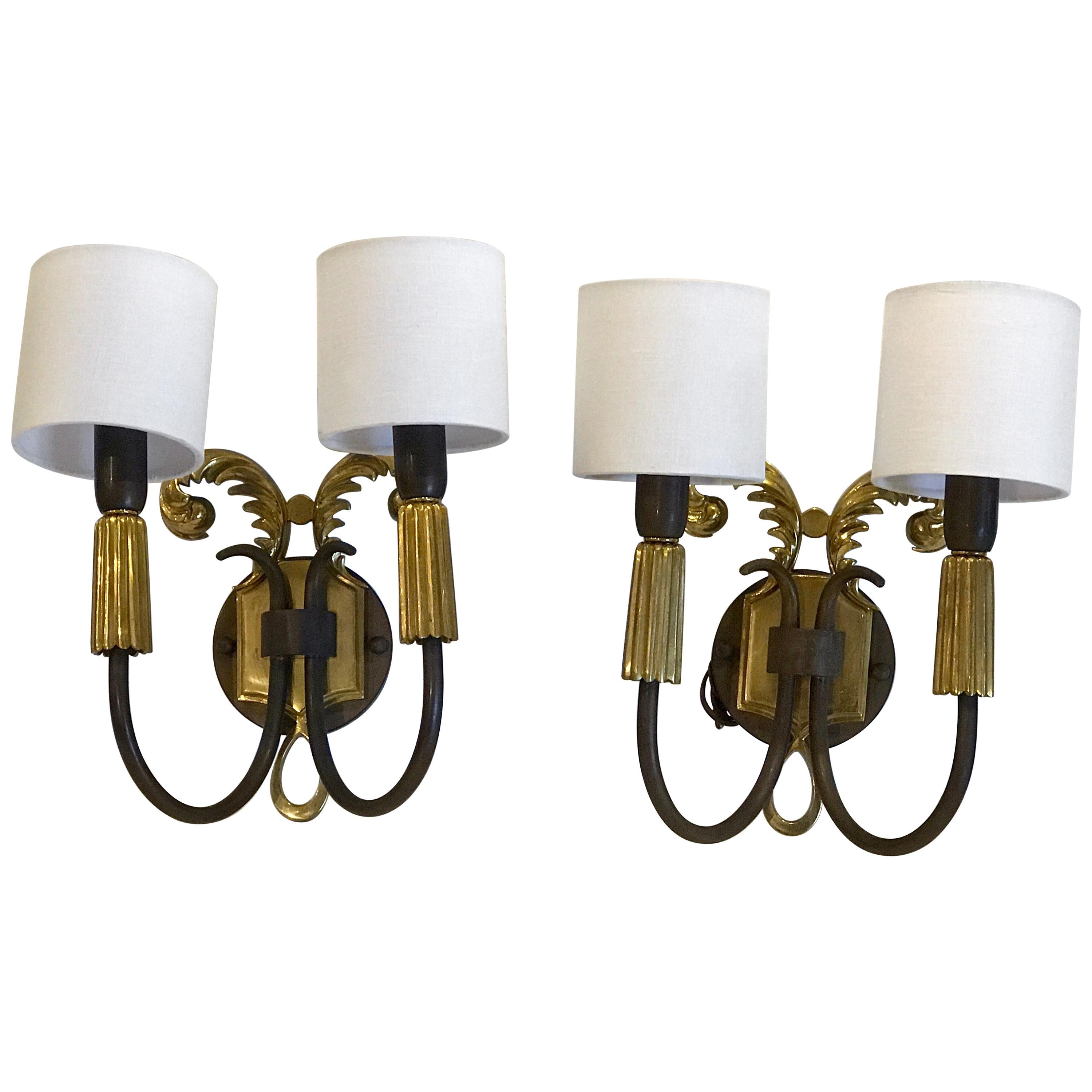 Pair of French Art Deco Gilt and Patinated Bronze Wall Sconces For Sale