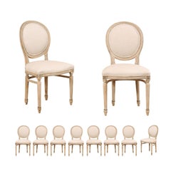 Set of 10 Louis XVI Style Upholstered and Carved Wood Oval-Backed Dining Chairs