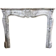 Antiker Marmorkamin im Louis-XV-Stil