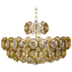 Circular Gilt Brass and Optical Lens Crystal Multi Tier Chandelier by Palwa