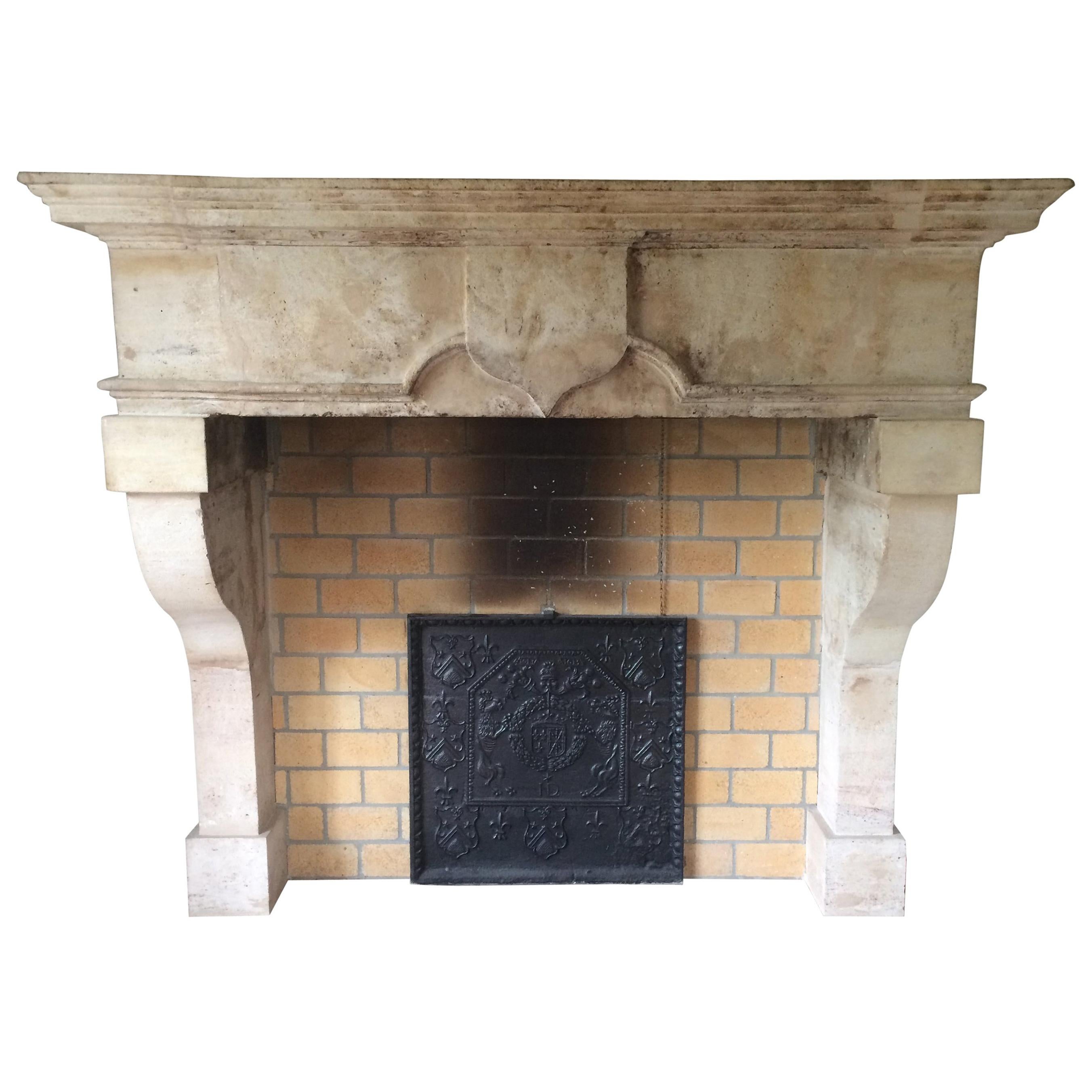 French Louis XIII Style Fireplace in Limestone, 18th Century, Lorraine, France. For Sale