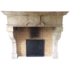 French Louis XIII Style Fireplace in Limestone, 18th Century, Lorraine, France.