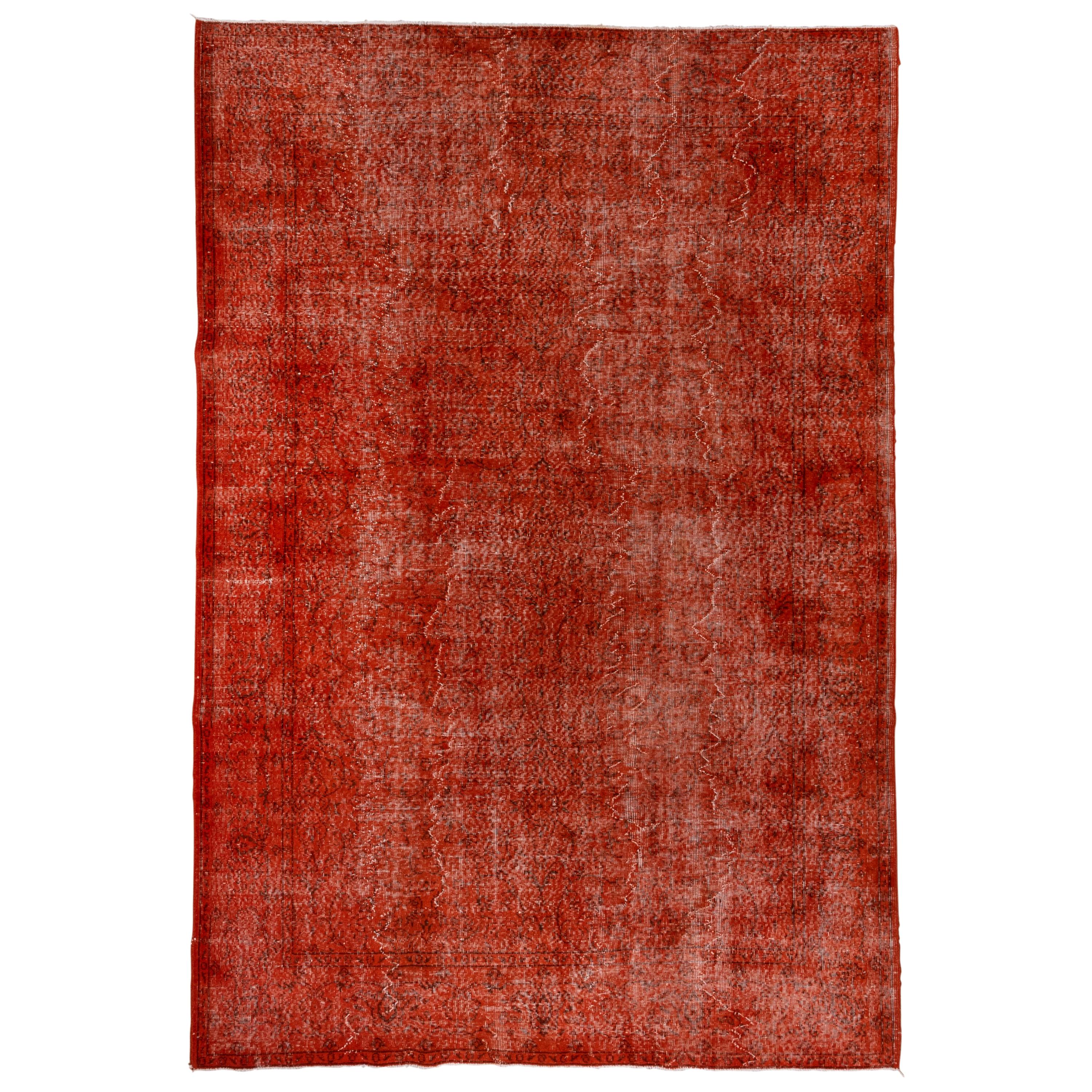 Roter überzogener Vintage-Teppich